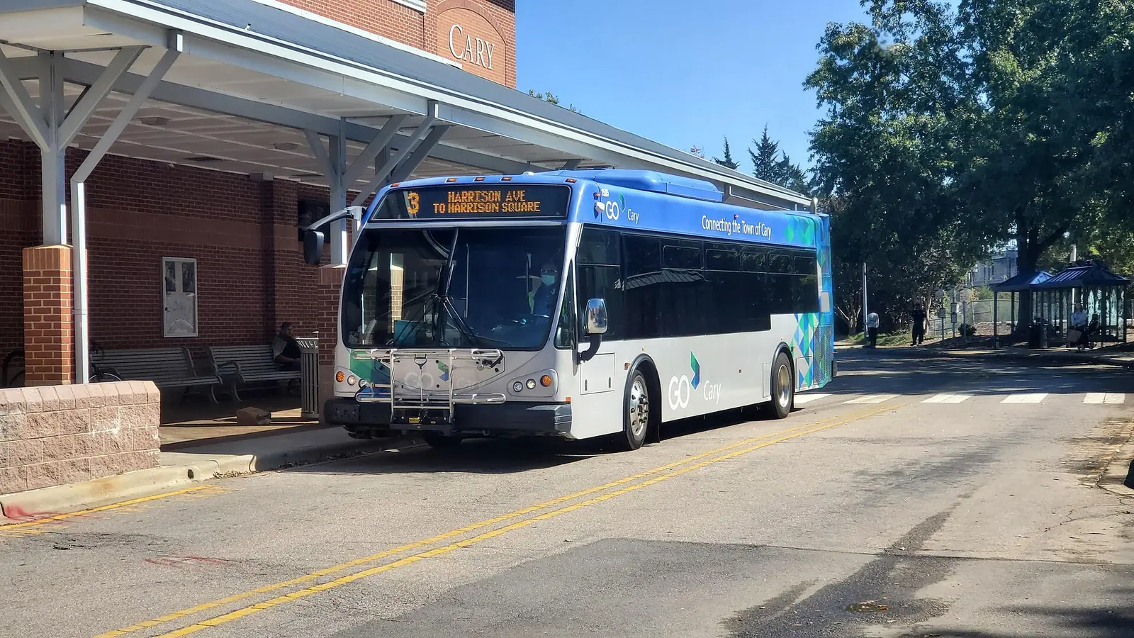A GoCary bus on Route 3, Harrison, waits at the Cary station downtown before leaving for Harrison Square.