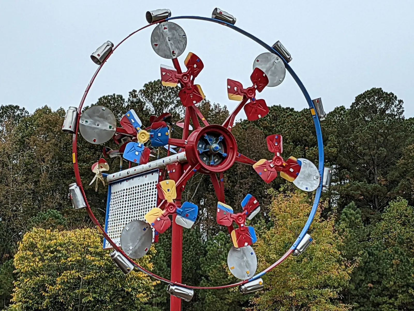 A whirligig sculpture spinning at North Cary Park.