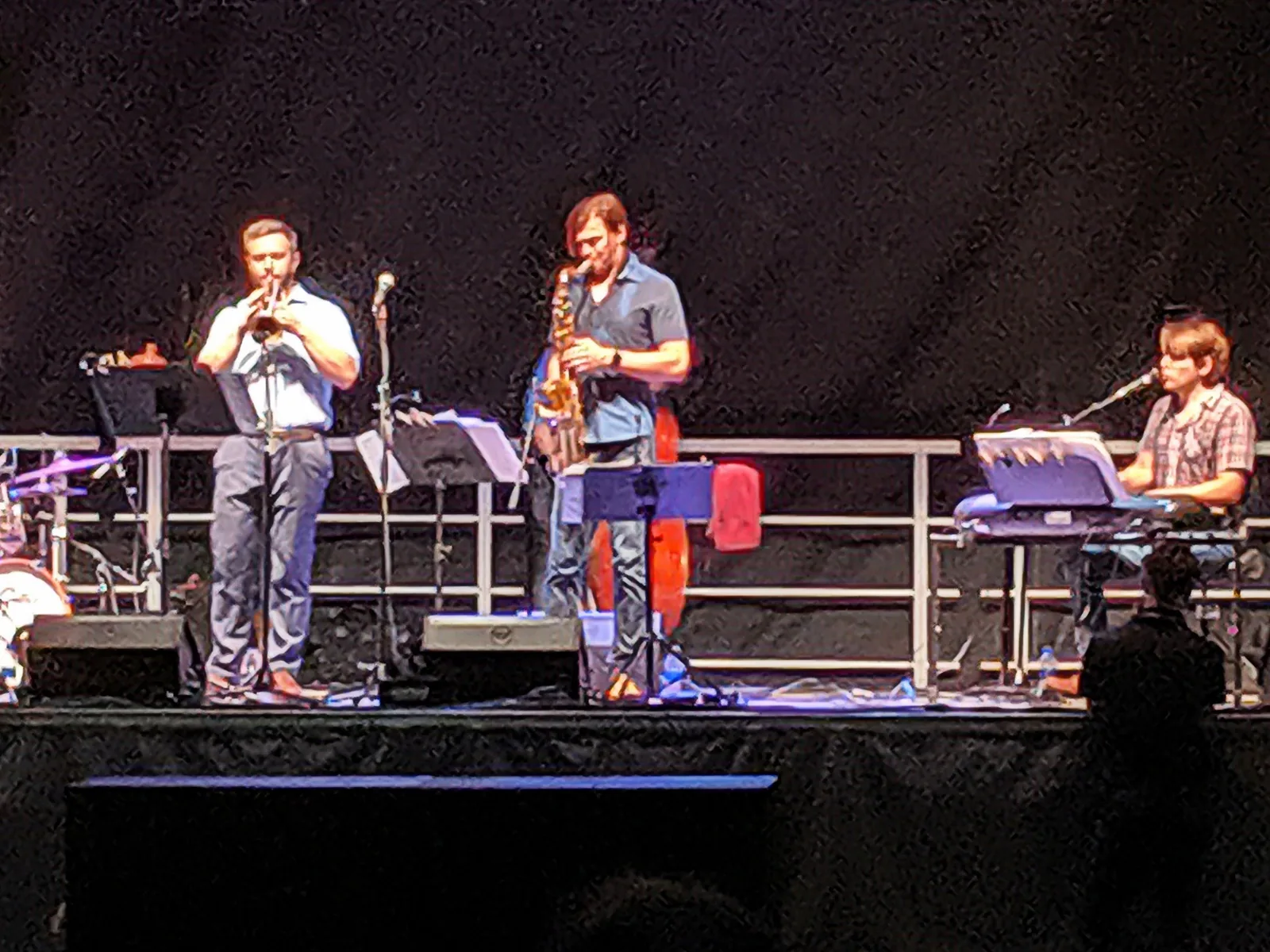 A jazz band playing an outdoor stage in downtown Cary.
