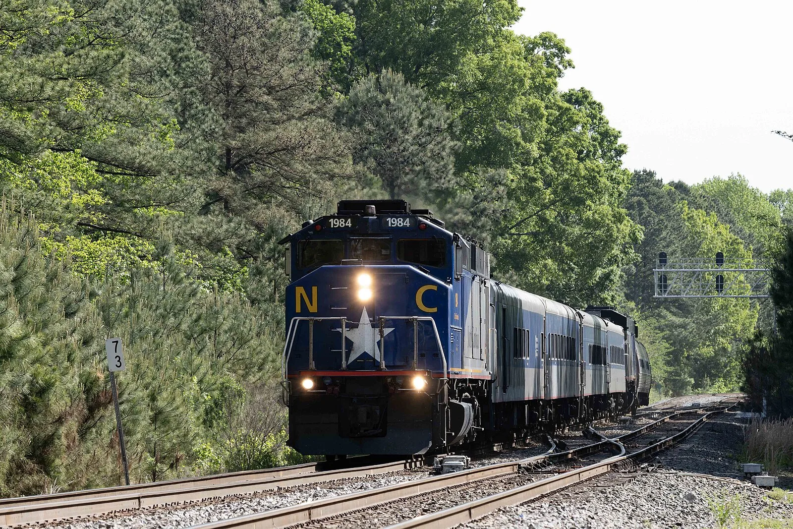 An Amtrak Piedmont passenger train in Cary. The picture does not show the Maynard Road crossing.