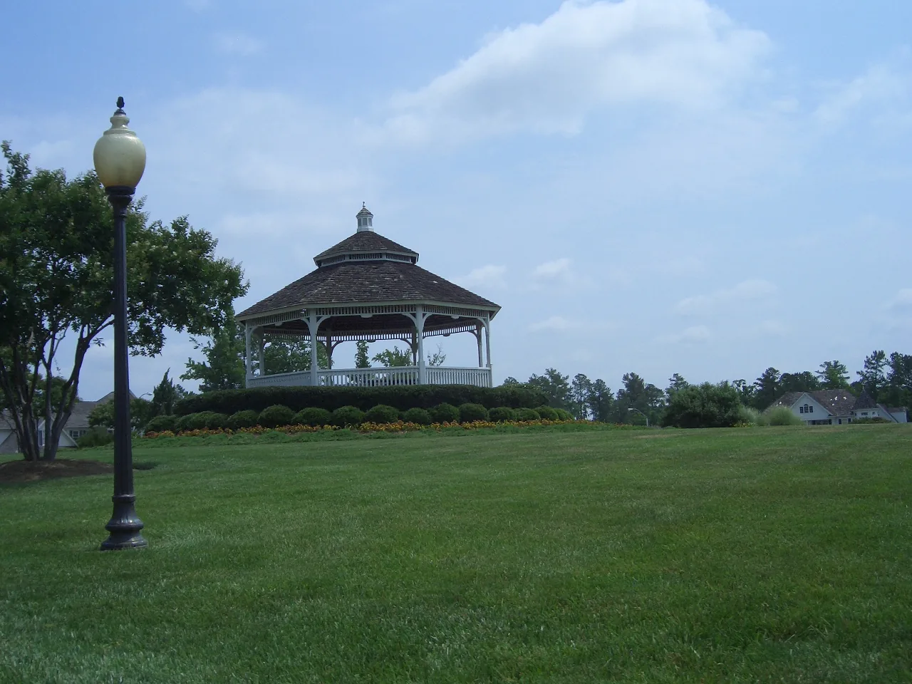 A white gazebo on a lawn in the Preston area of northwest Cary