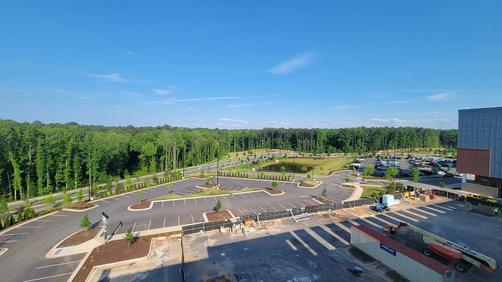 New parking lots and buildings under construction at Fenton, the mixed-use development in eastern Cary, seen from above in 2023.