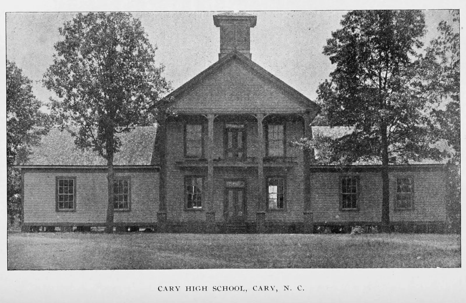 Cary High School's two-story frame building, in a historic photograph from a North Carolina state school report