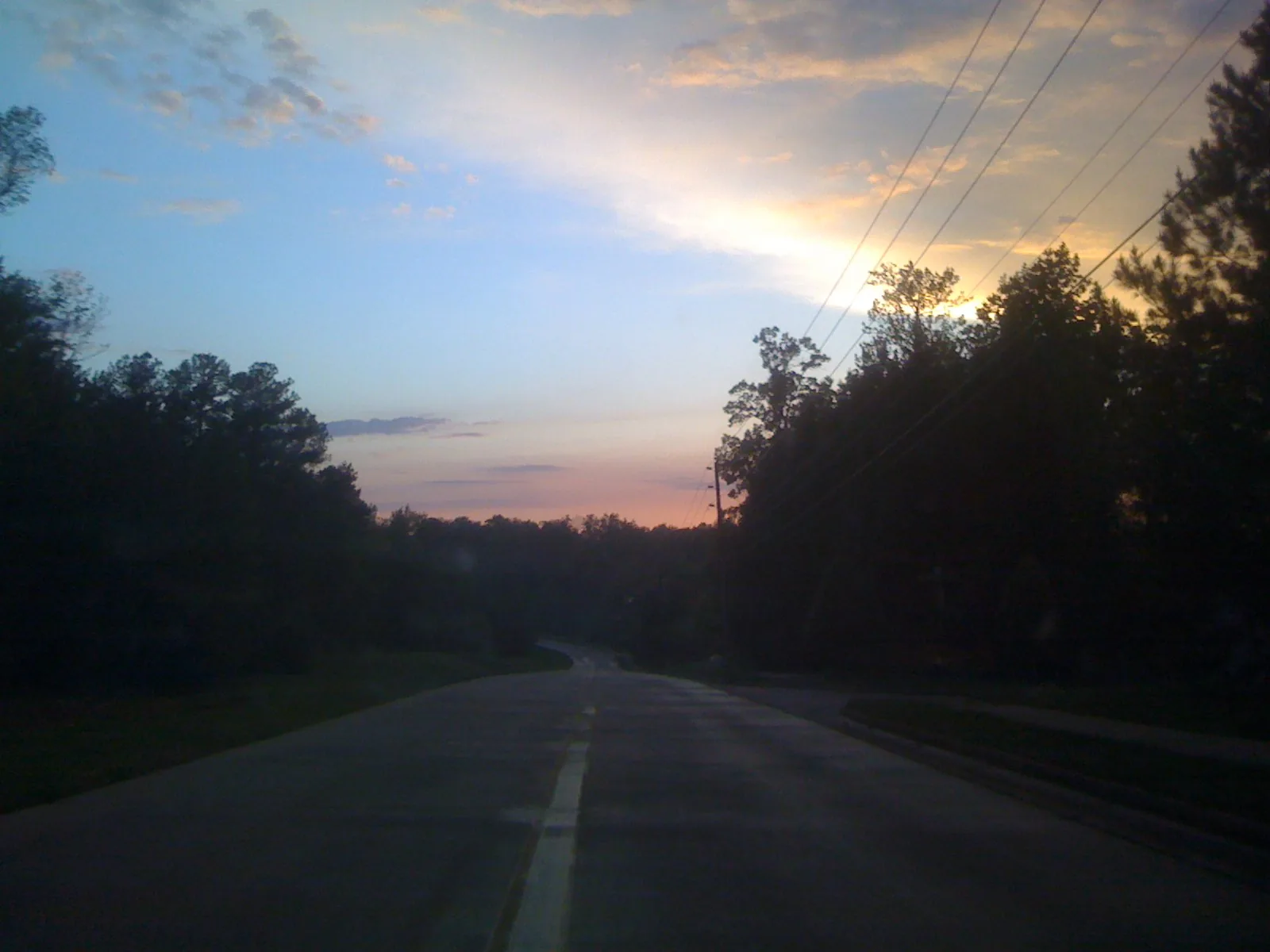 Cary Parkway, one of the town-maintained thoroughfares that loops through Cary, at dusk.
