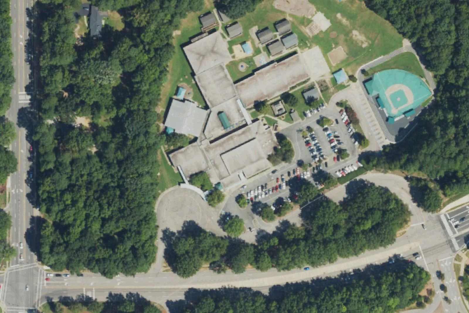 Adams Elementary School's building, playground and parking lot off Cary Towne Boulevard, seen from the air