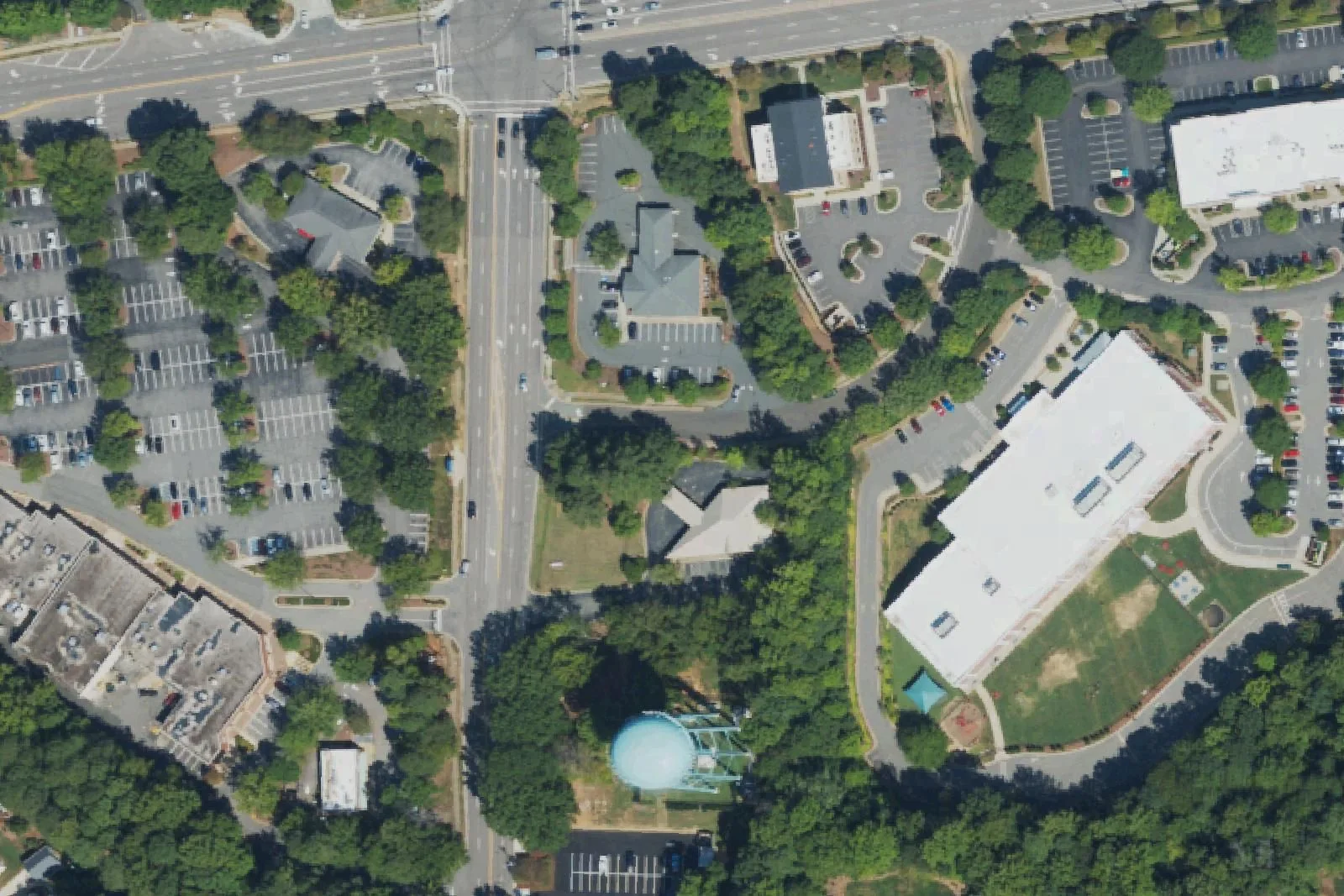 Cardinal Charter Academy's building and field off St. Charles Place, seen from the air