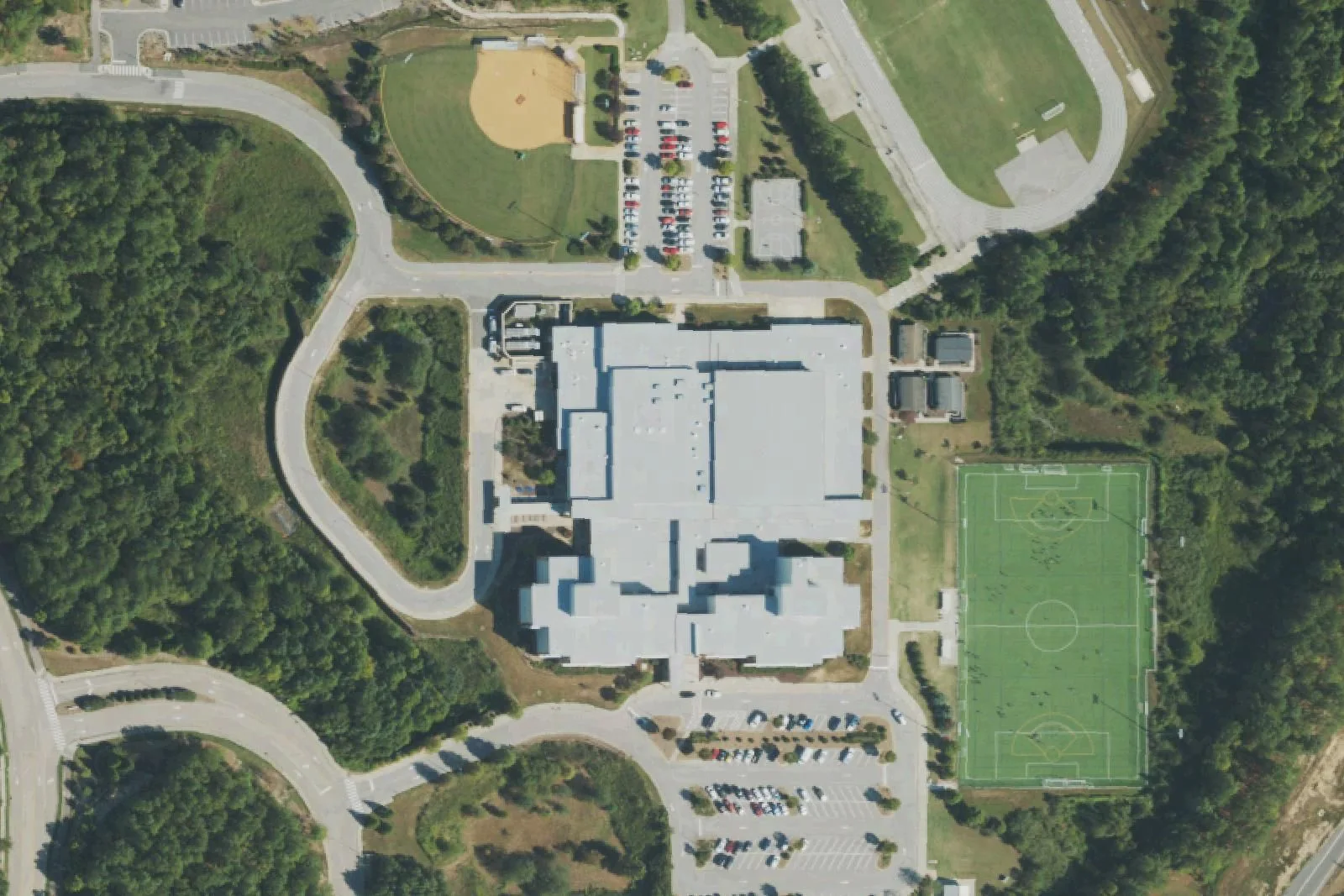 Mills Park Middle School's building, ball fields and soccer field on Mills Park Drive, seen from the air