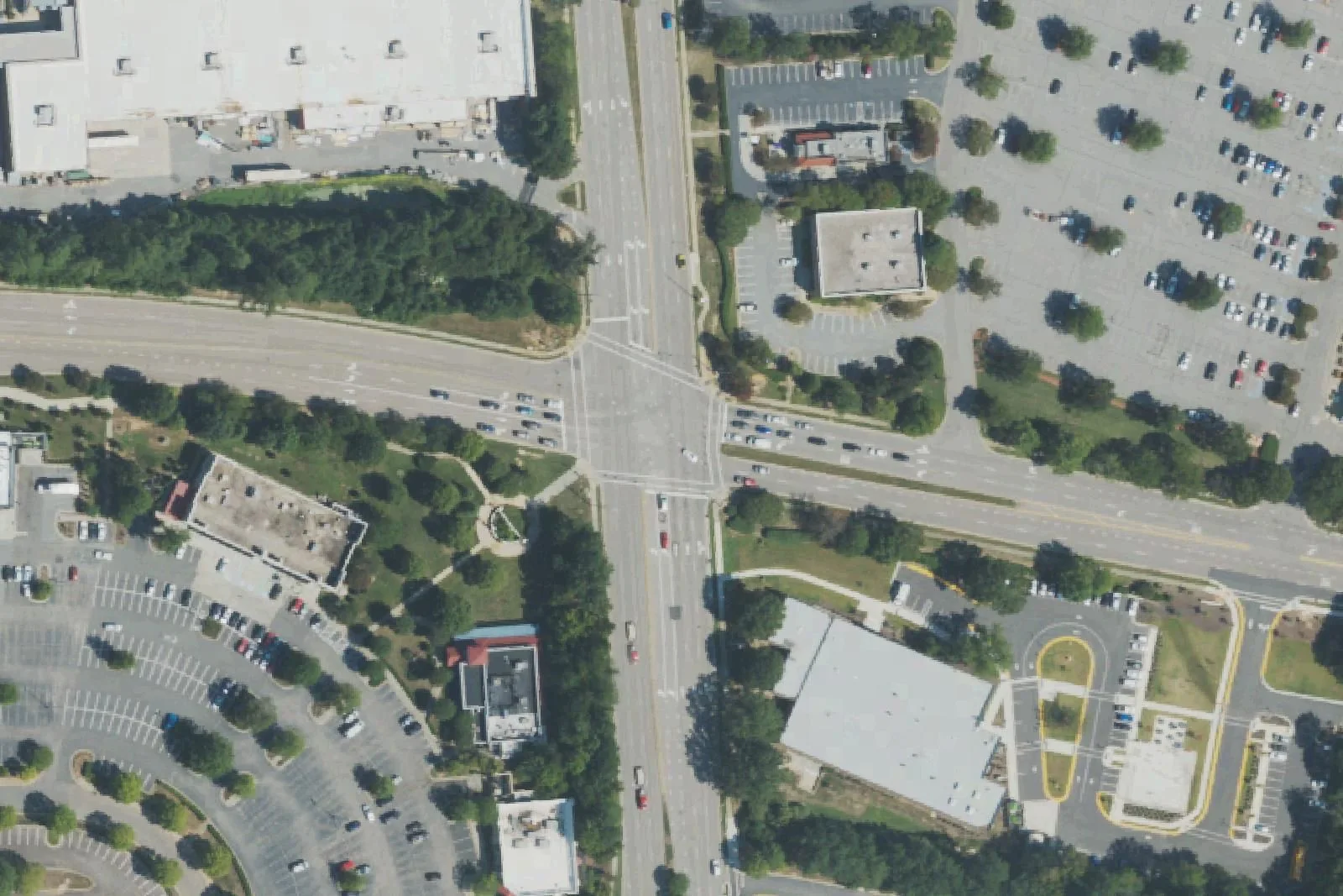 Walnut Street at Buck Jones Road in east Cary, the commercial area around Wake STEM Early College High School at 2205 Walnut St., seen from the air